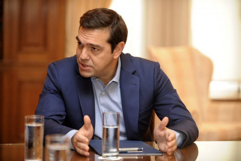 <a href="http://www.kathimerini.gr" class=